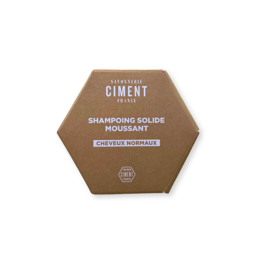 Shampoing solide moussant ciment.