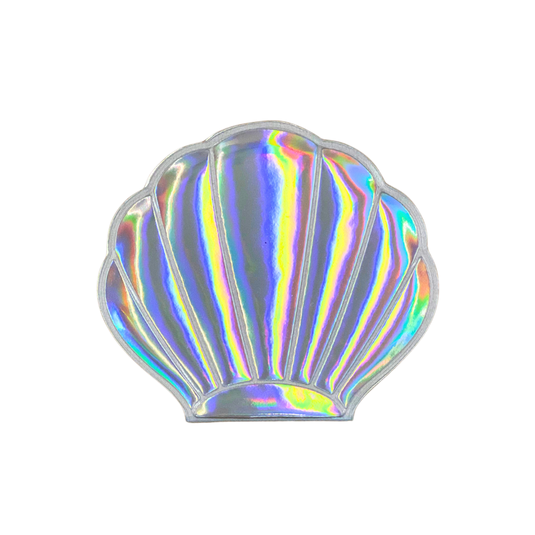 Espejo de bolsillo concha plateada de La Crème, pequeño tesoro práctico y siempre a mano.