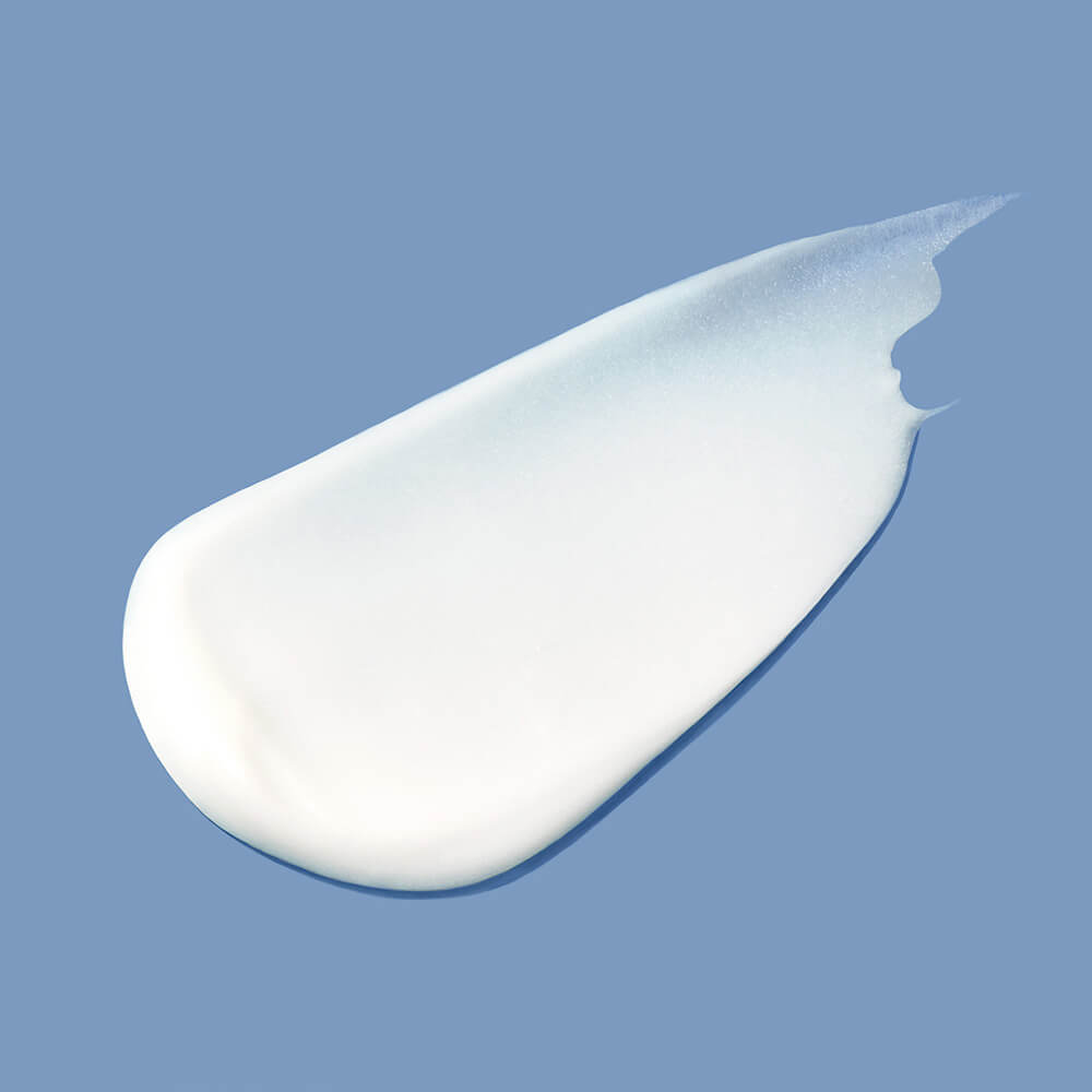 Textura rica y ligera de la crema para rizos Quiet Calm, ideal para definir sin apelmazar.